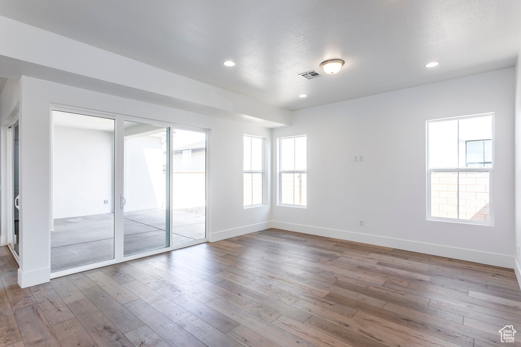 Spare room featuring light hardwood / wood-style floors