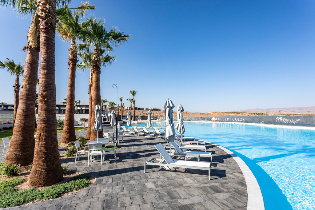 View of swimming pool with a water view