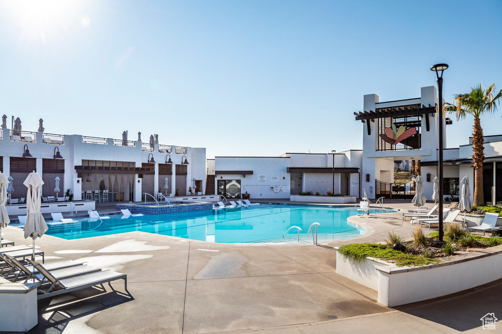 View of swimming pool featuring a patio area