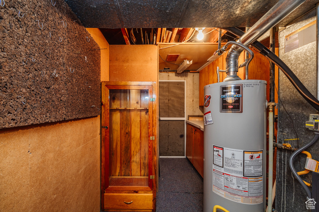 Utility room with gas water heater