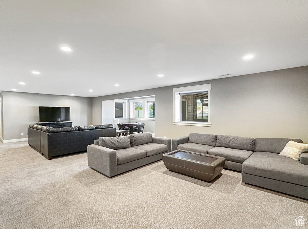 Living room with light colored carpet