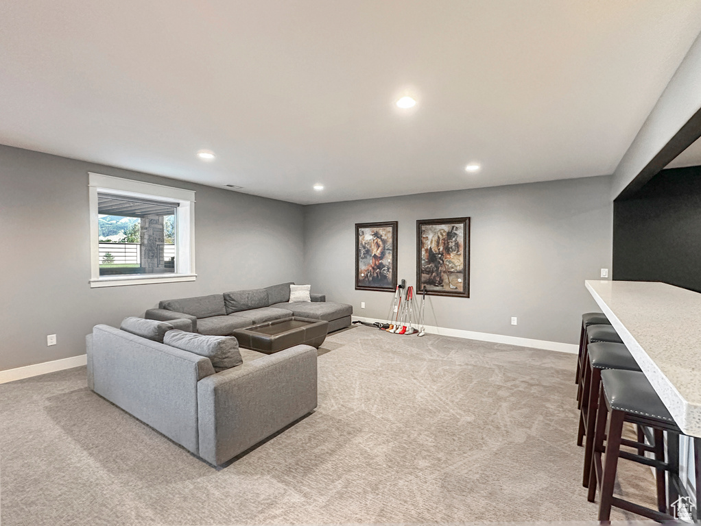 Living room with light colored carpet