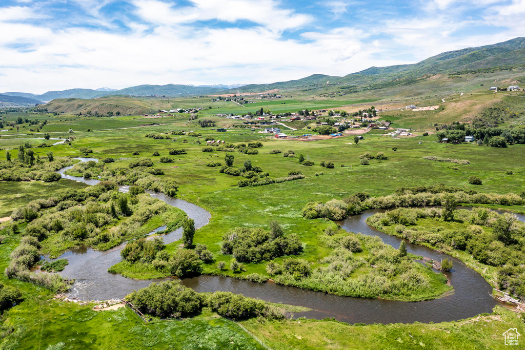 Bird's eye view featuring a water and mountain view and a rural view