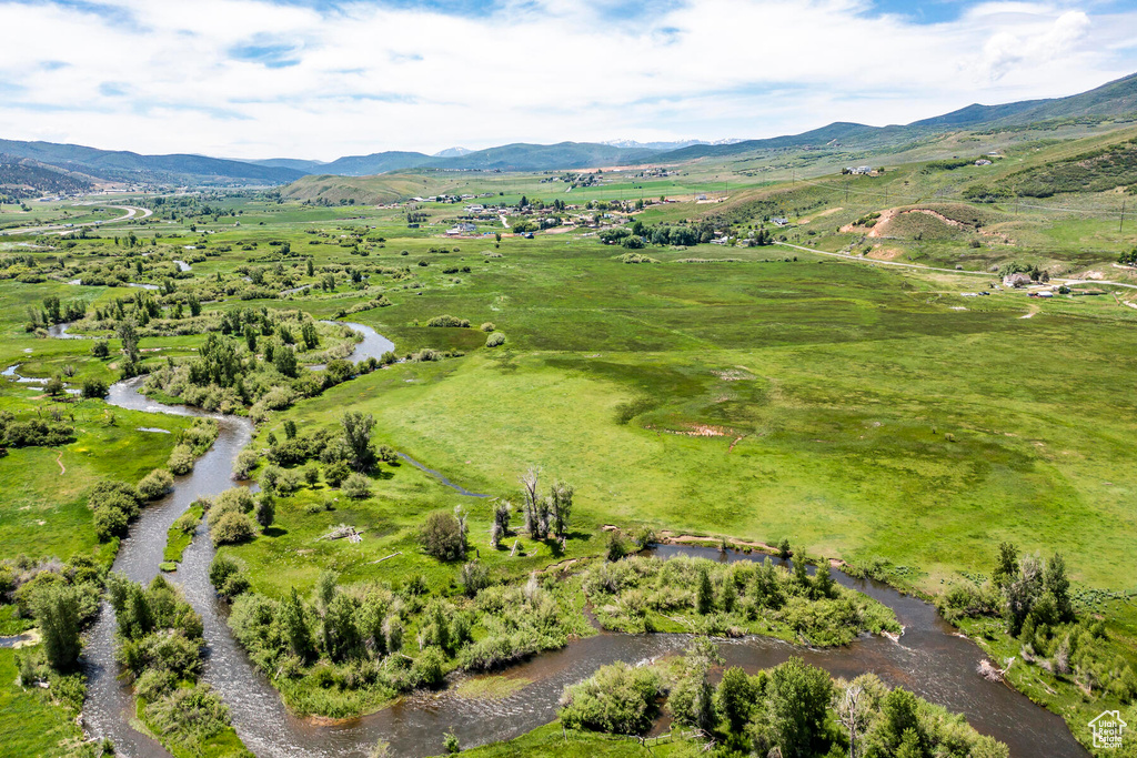 Drone / aerial view with a mountain view and a rural view