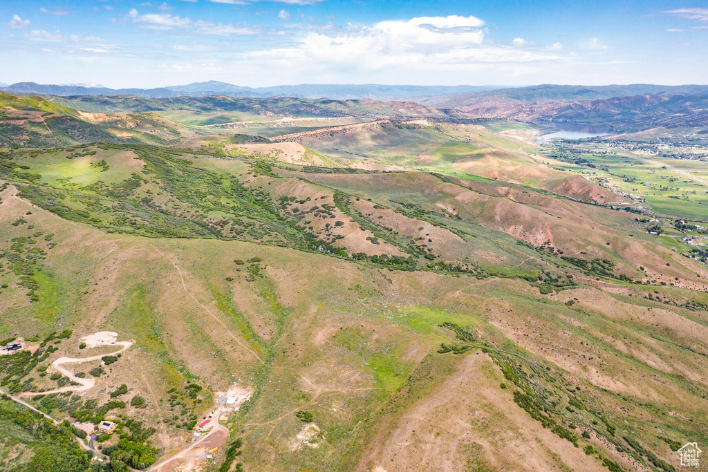 Birds eye view of property featuring a mountain view