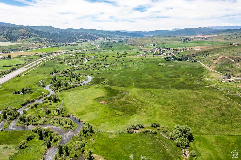 Birds eye view of property featuring a rural view and a mountain view