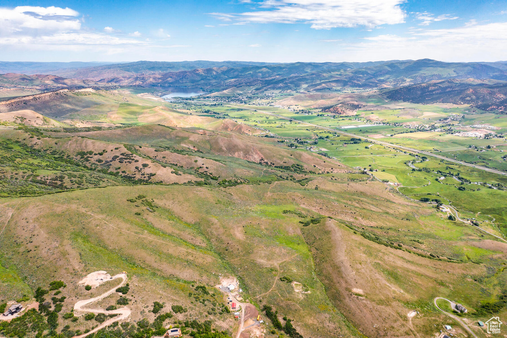 Drone / aerial view with a mountain view and a rural view