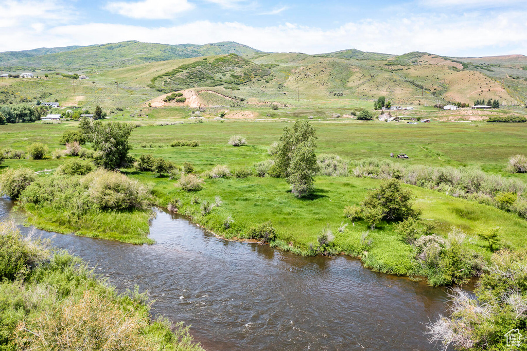 Property view of mountains featuring a rural view