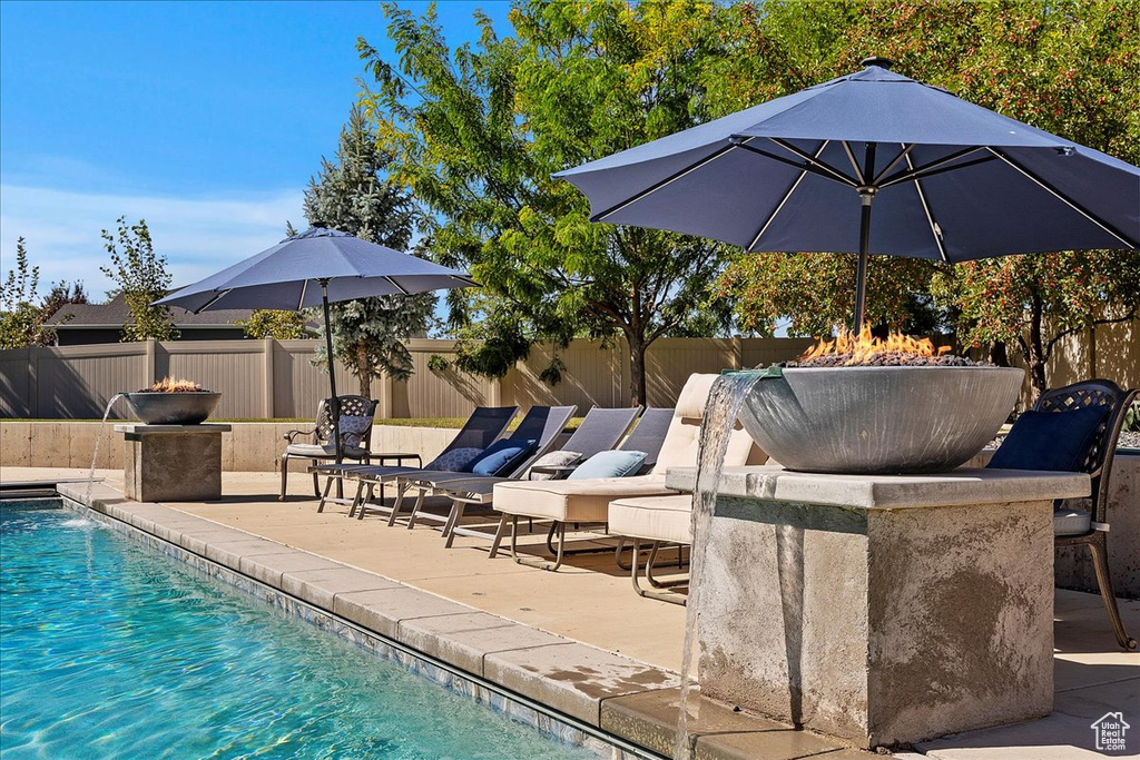 View of pool with a patio