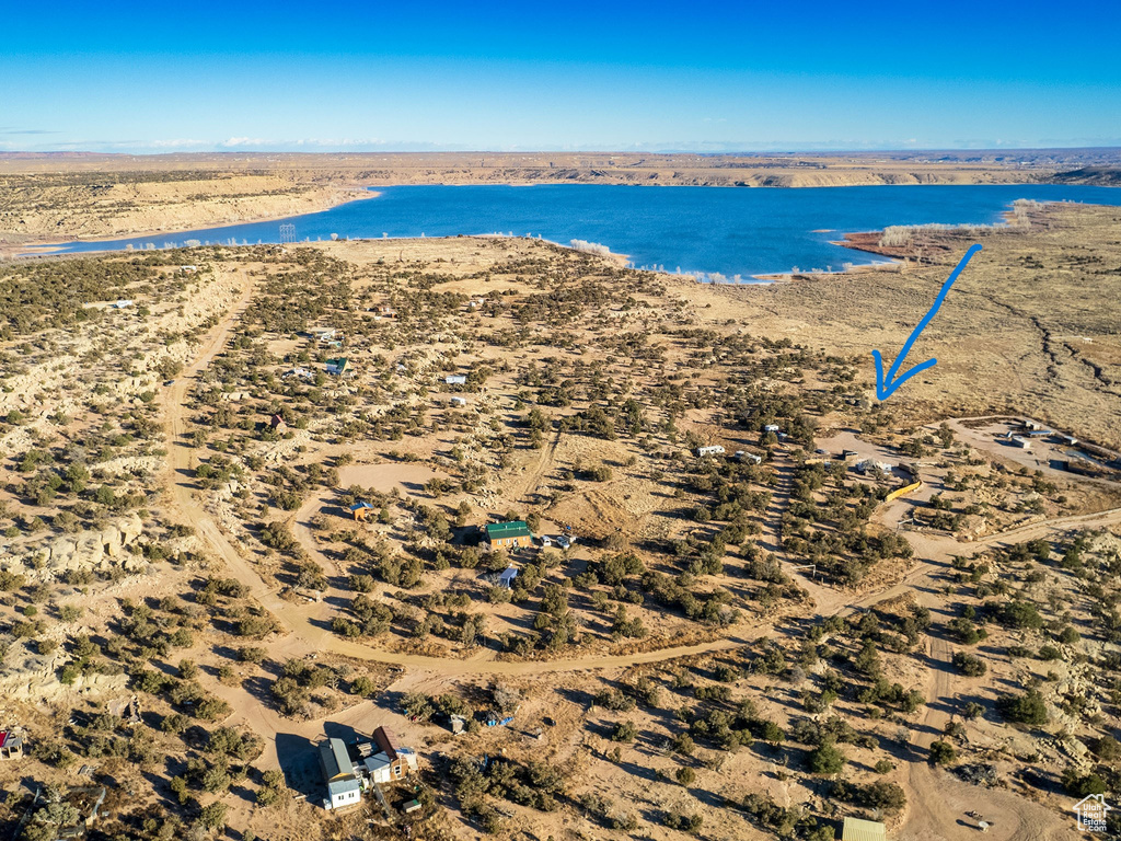 Drone / aerial view featuring a water view and a beach view