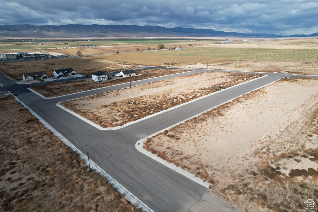 Drone / aerial view with a mountain view and a rural view