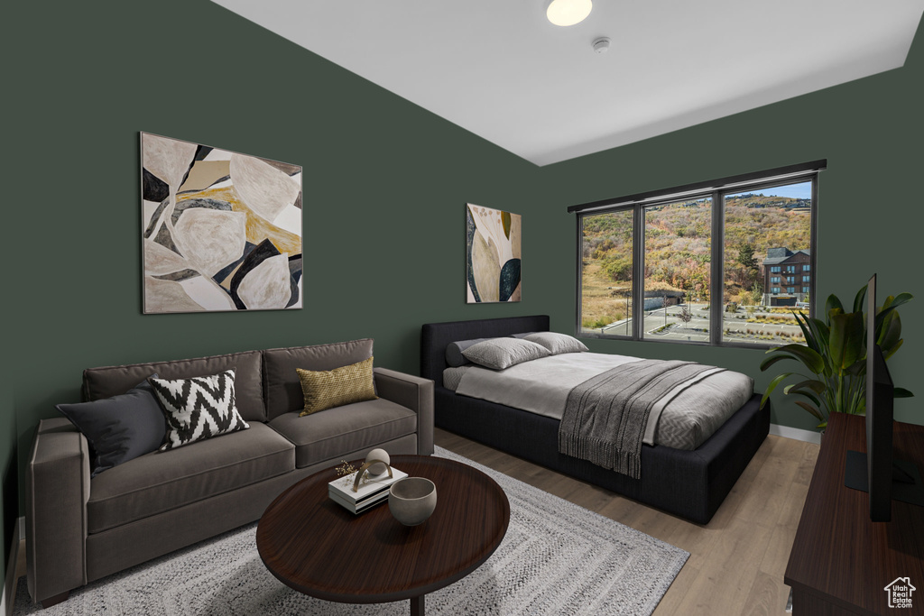 Bedroom with light wood-style floors