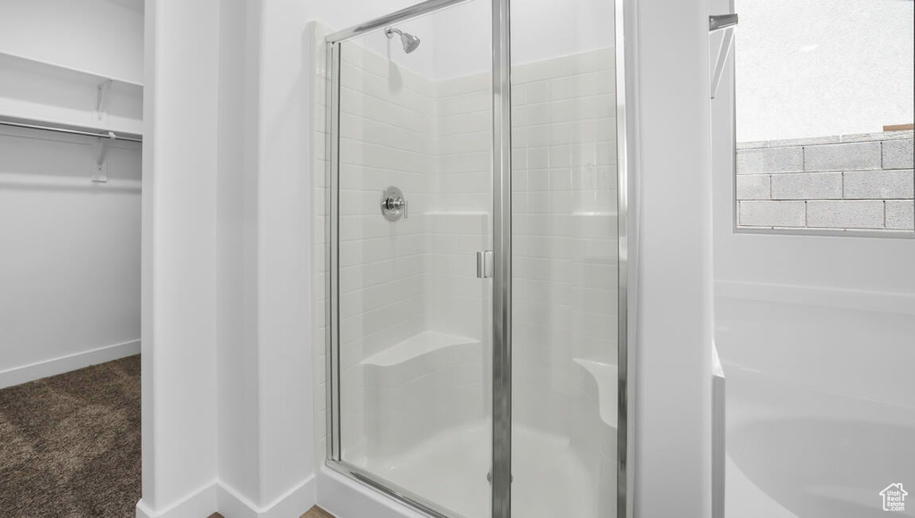 Bathroom with an enclosed shower