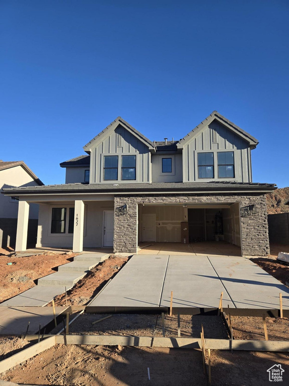 View of front of house with a patio