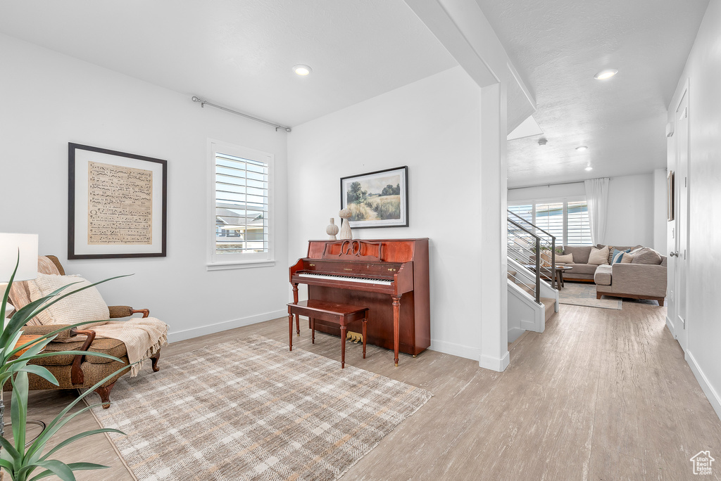 Sitting room featuring light wood-type flooring