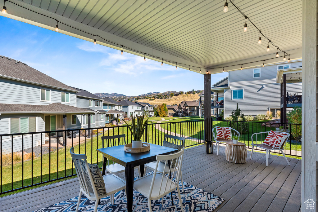 Deck featuring a yard