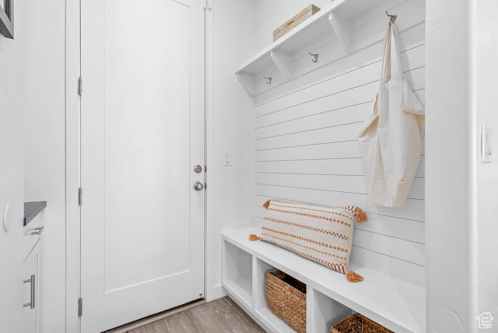 Mudroom with light wood-type flooring