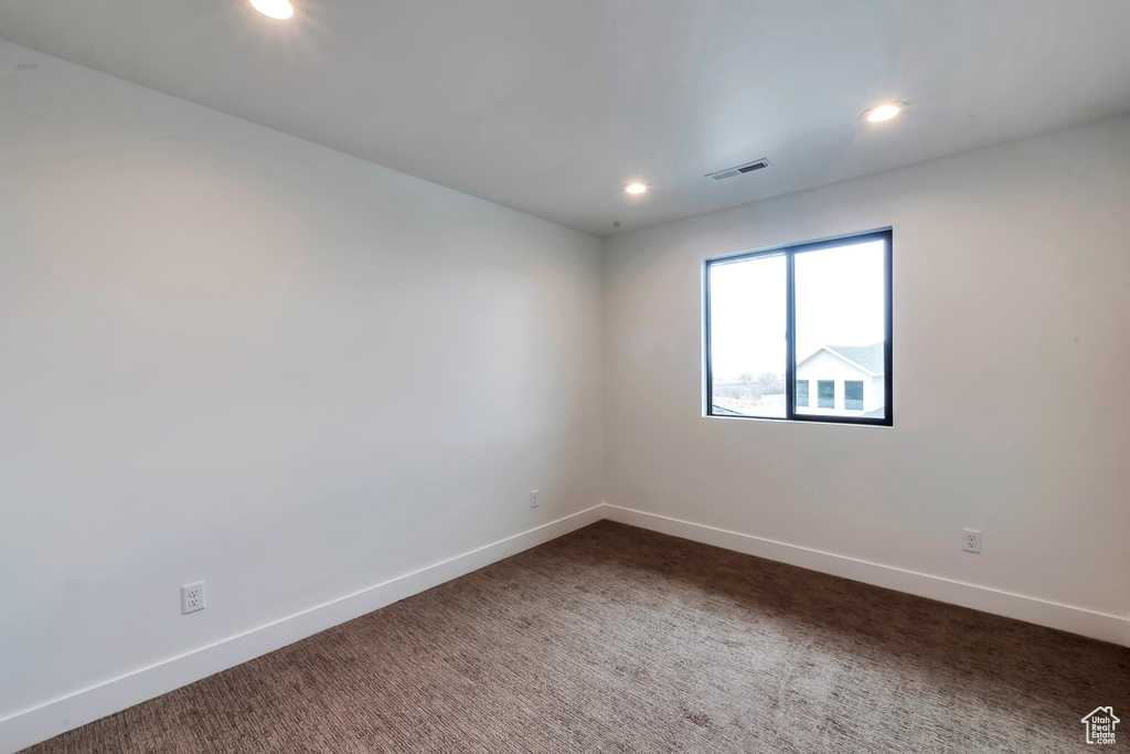 View of carpeted spare room