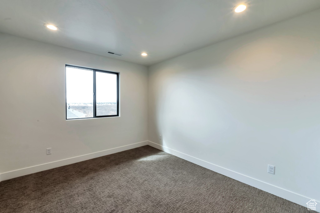 View of carpeted spare room