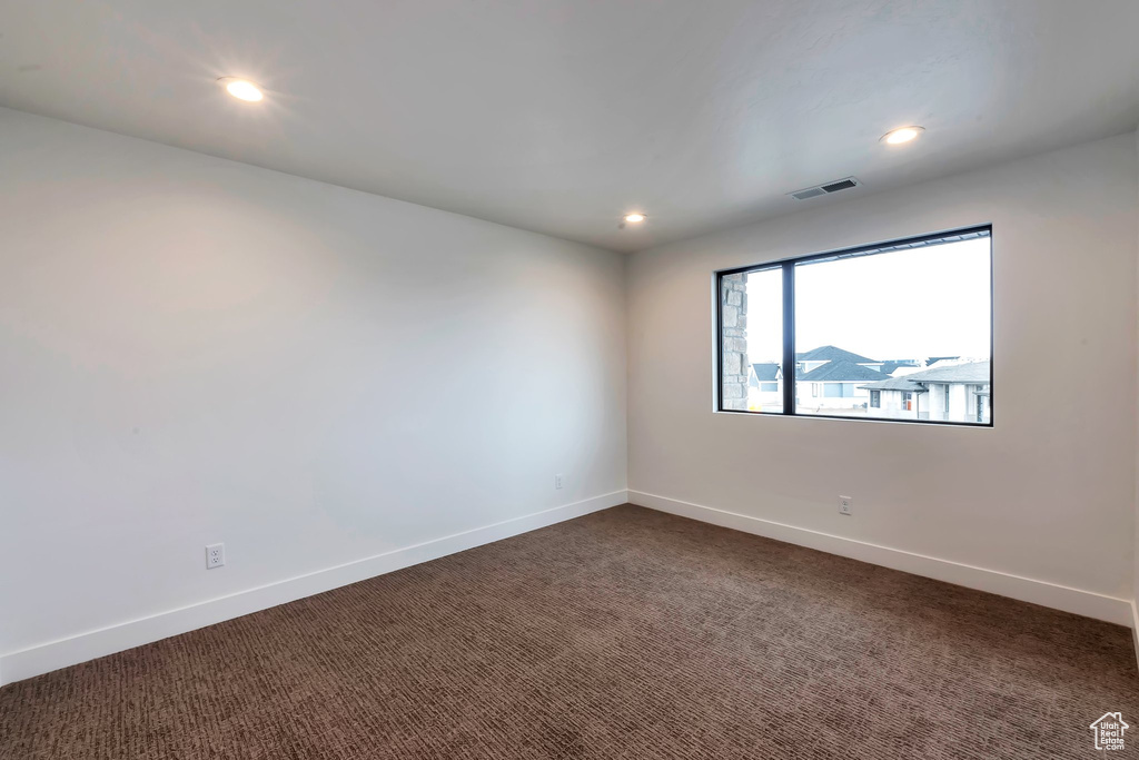 View of carpeted spare room