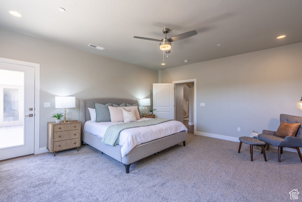 Bedroom featuring carpet floors and ceiling fan