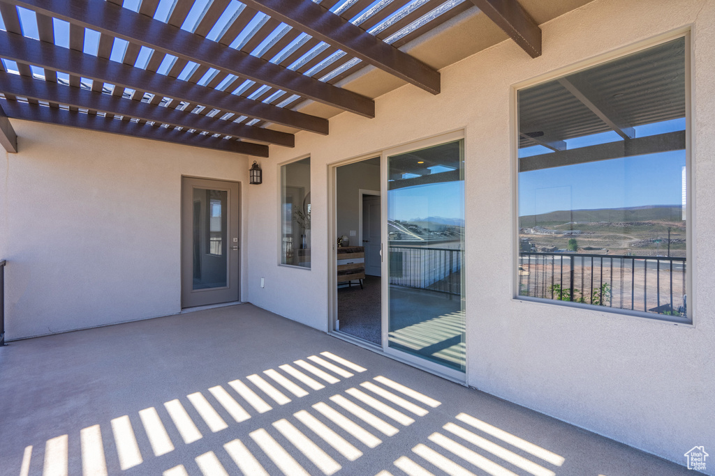 View of patio / terrace featuring a mountain view and a pergola
