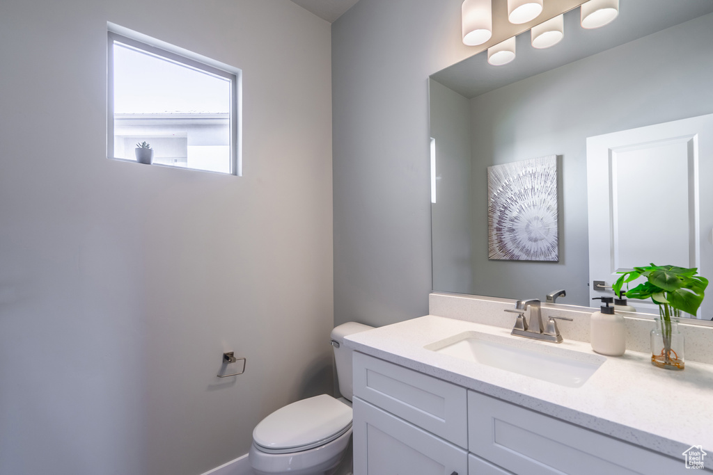 Bathroom with vanity and toilet