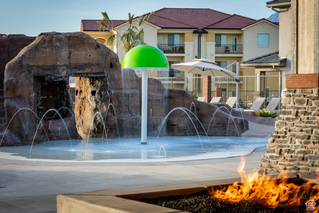 Exterior space with a fire pit