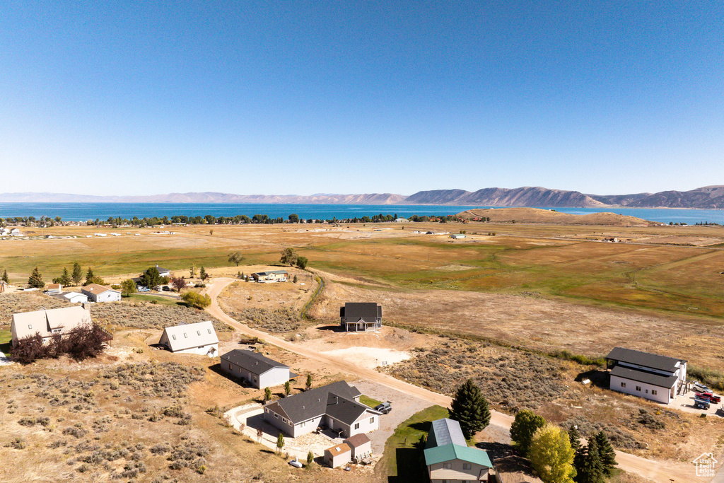 Birds eye view of property featuring a mountain view and a rural view