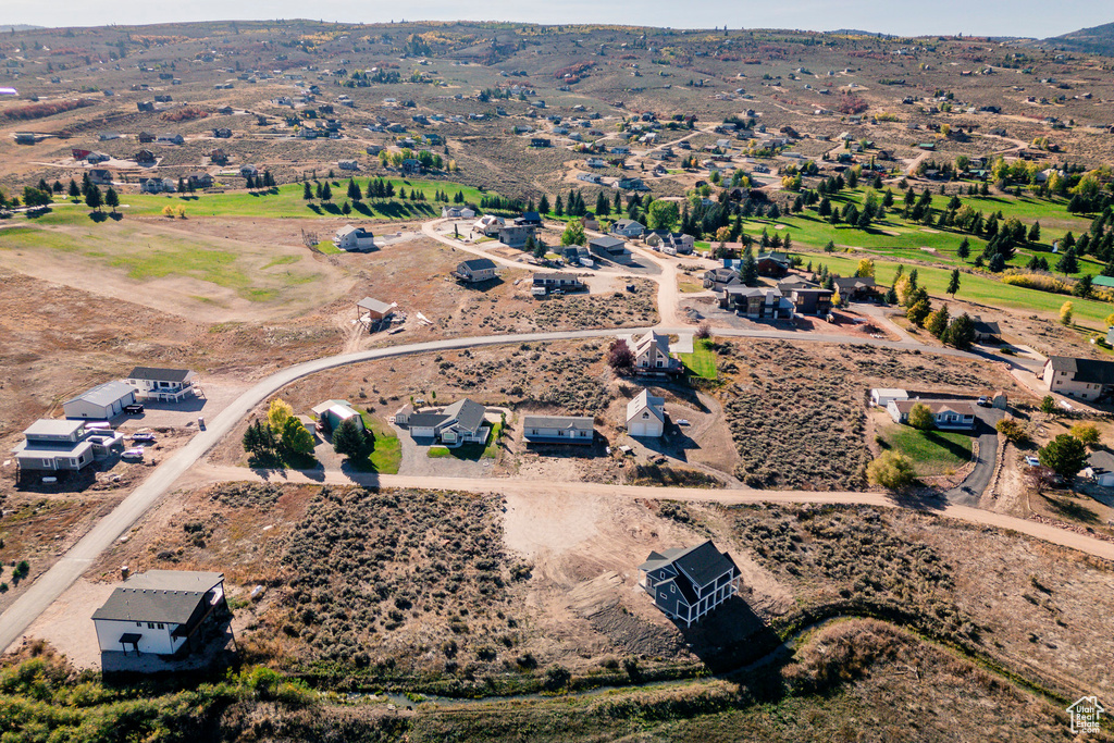 Birds eye view of property with a rural view