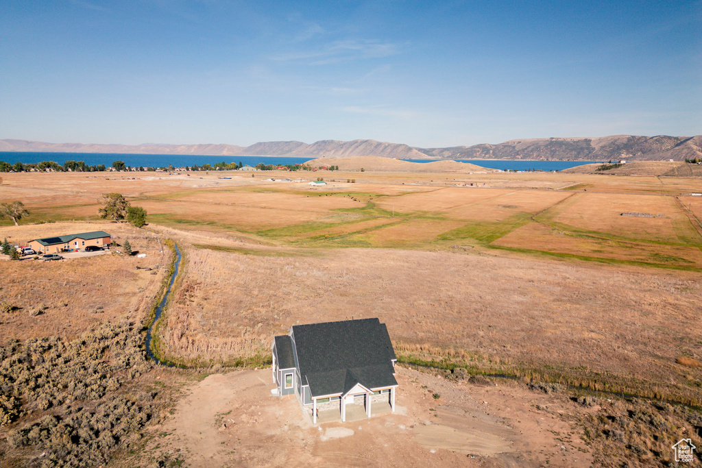 Birds eye view of property featuring a mountain view and a rural view