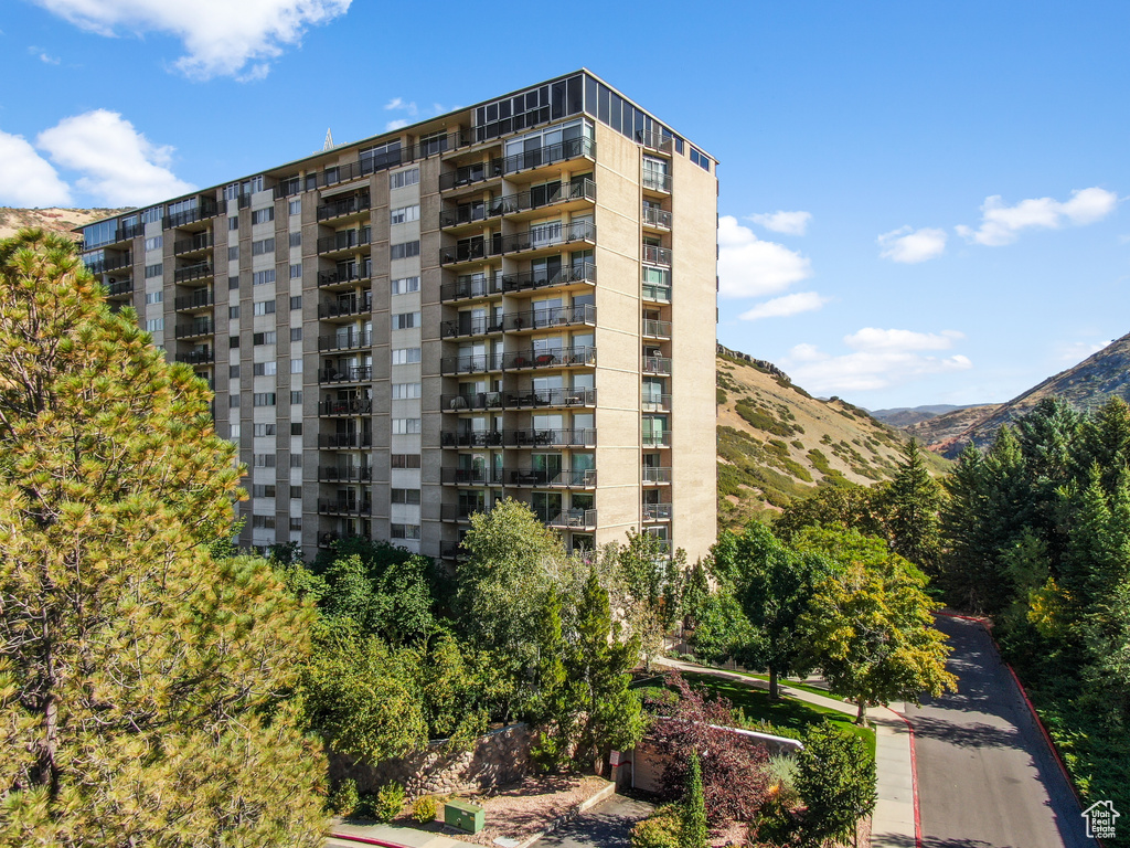 View of building exterior featuring a mountain view