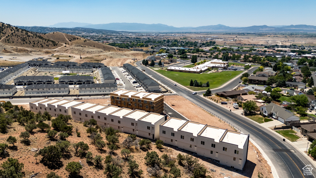 Birds eye view of property with a mountain view