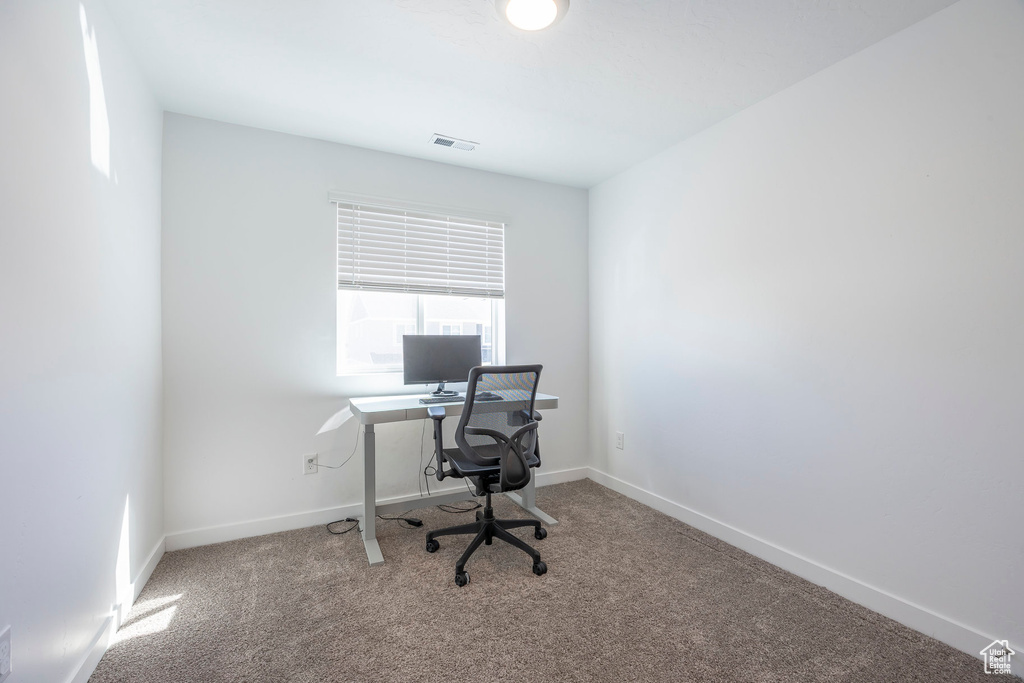 Office with carpet flooring