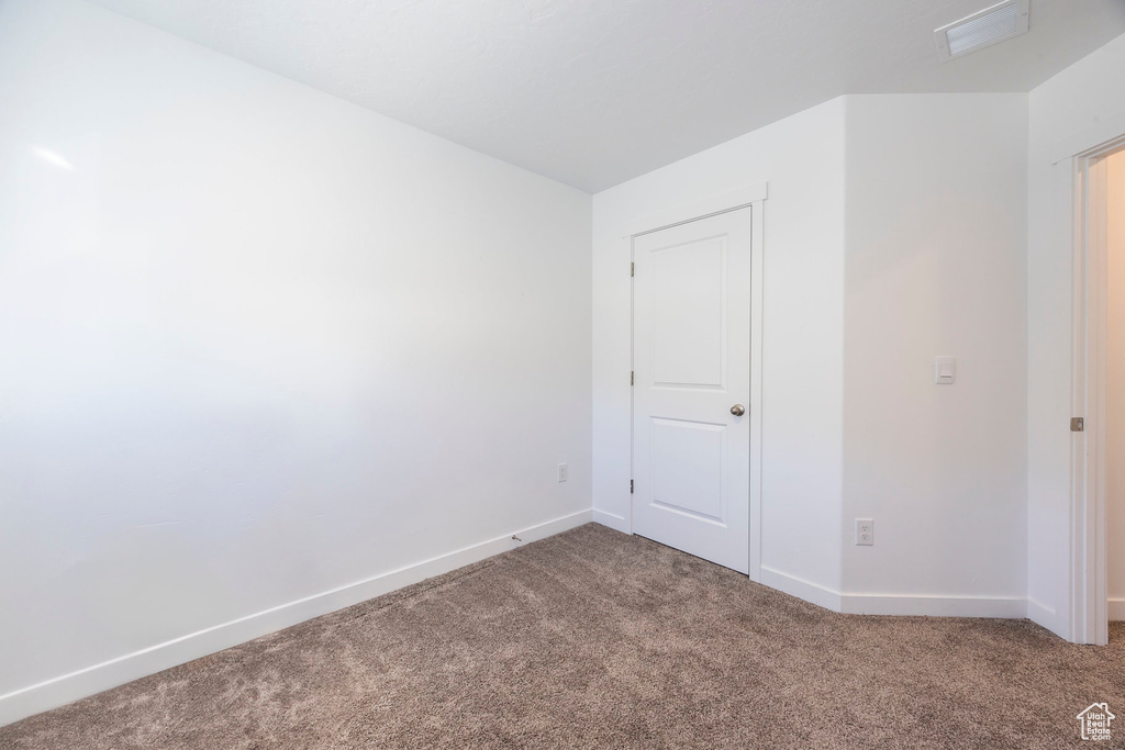 Interior space featuring carpet flooring