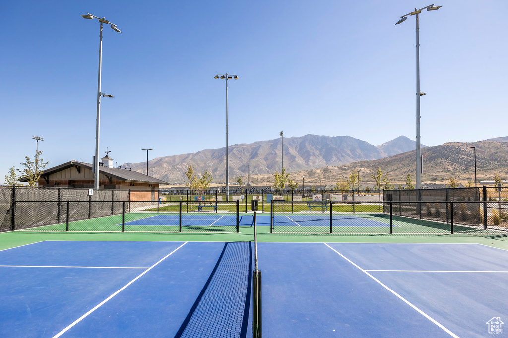 View of sport court with a mountain view