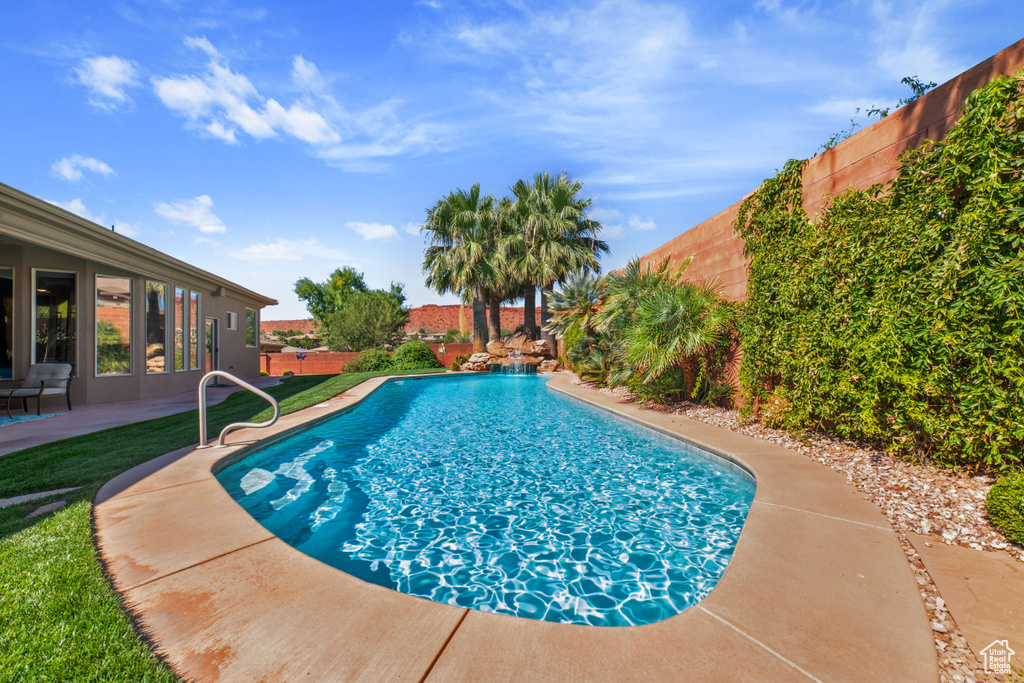 View of swimming pool featuring a patio area