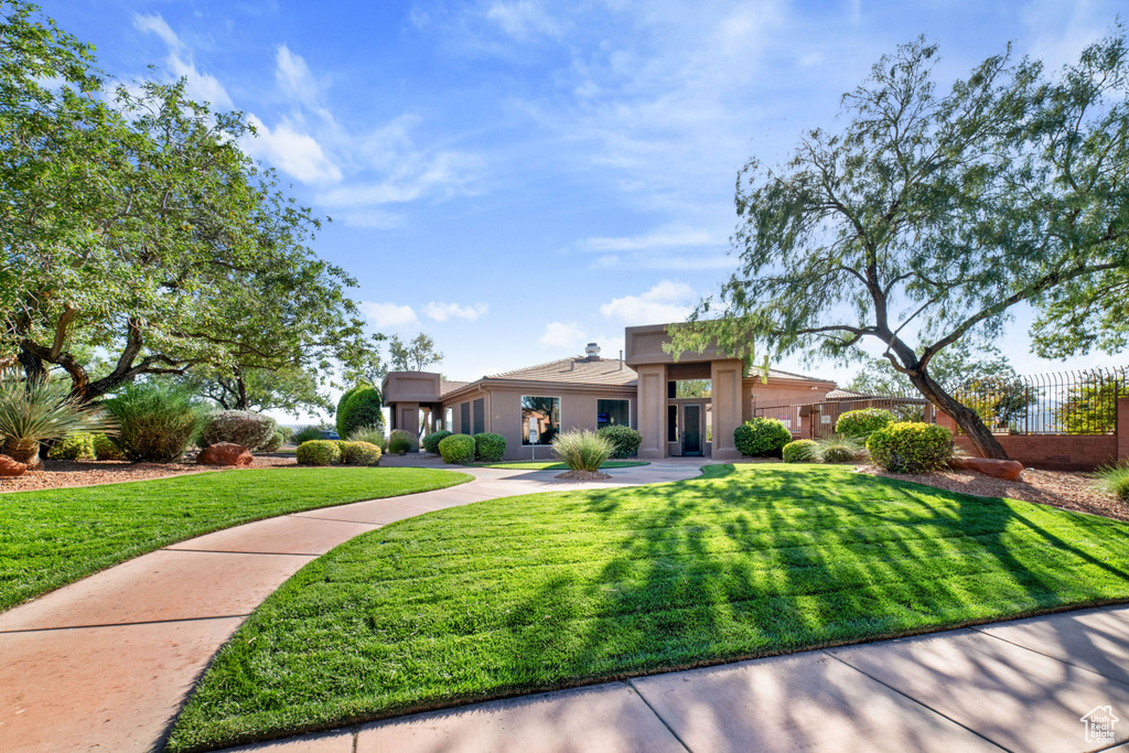 View of front of house with a front lawn