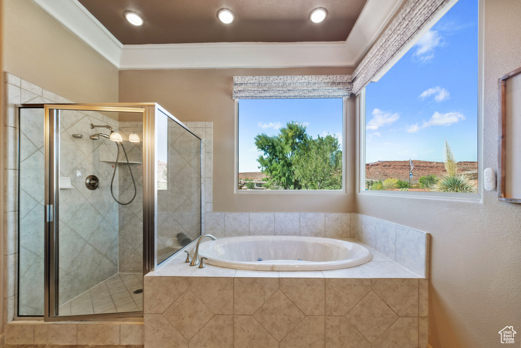 Bathroom featuring plus walk in shower