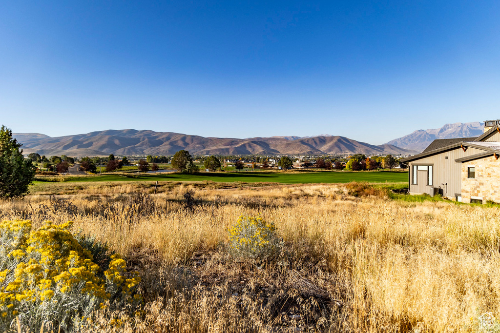 Property view of mountains featuring a rural view