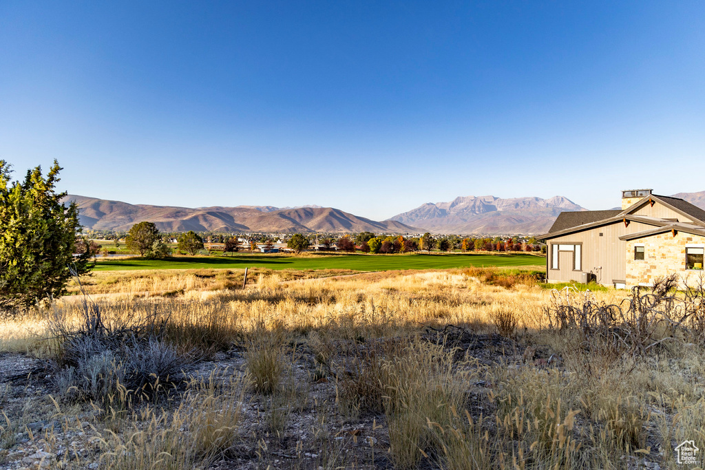 Property view of mountains featuring a rural view