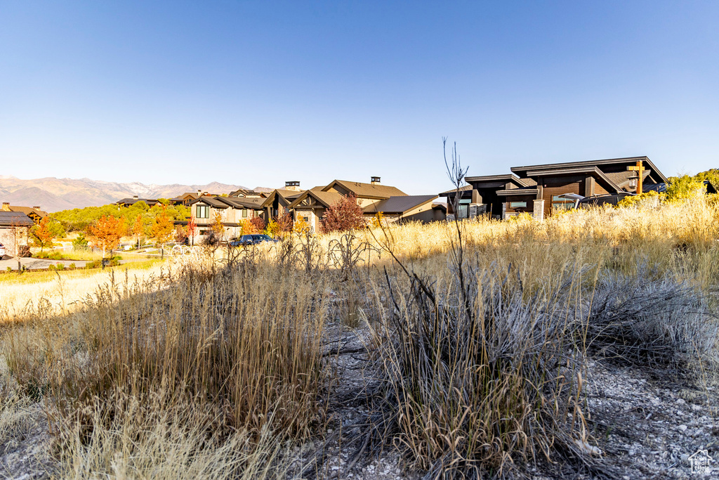 Back of house with a mountain view