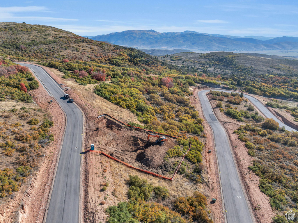 Birds eye view of property featuring a mountain view