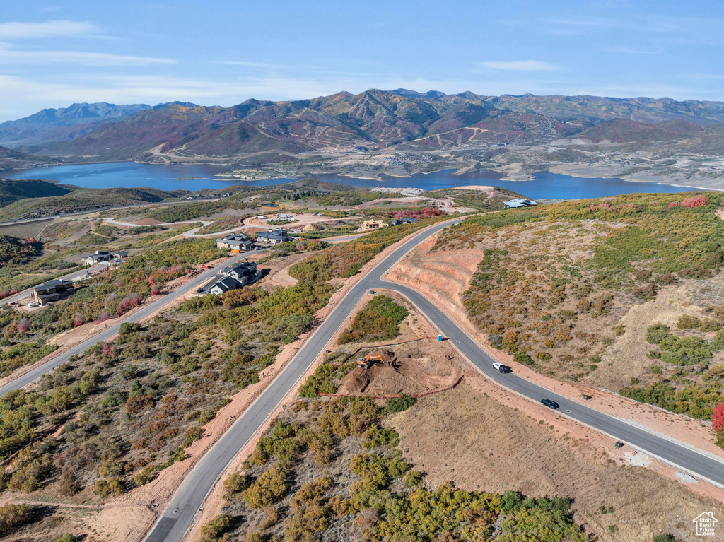 Bird\'s eye view with a water and mountain view