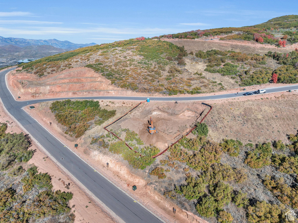 Birds eye view of property featuring a mountain view