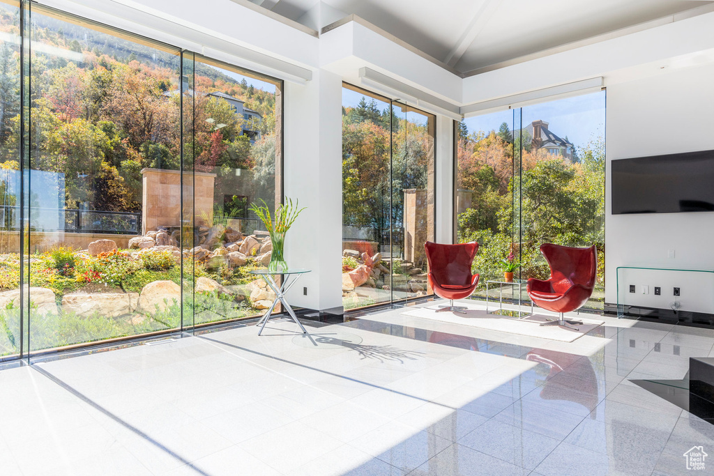 Unfurnished sunroom with plenty of natural light