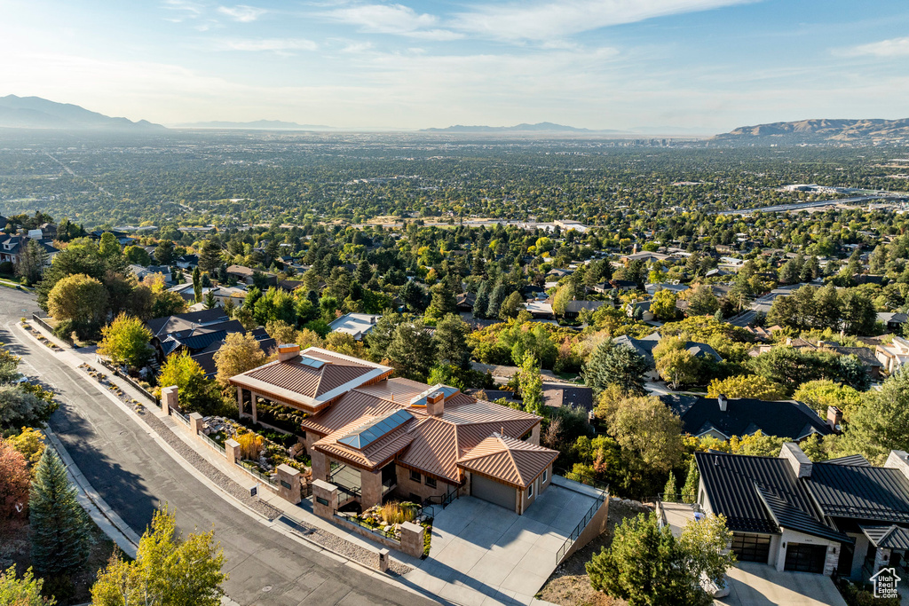 Aerial view of residential area with a mountain backdrop