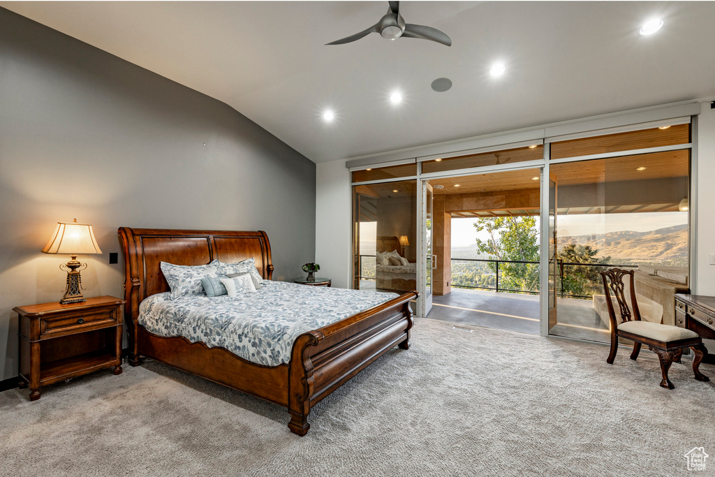 Carpeted bedroom with lofted ceiling, access to outside, and ceiling fan