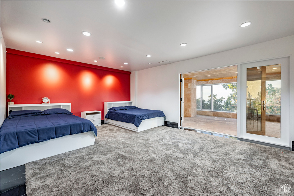 Bedroom with carpet floors, recessed lighting, and baseboards