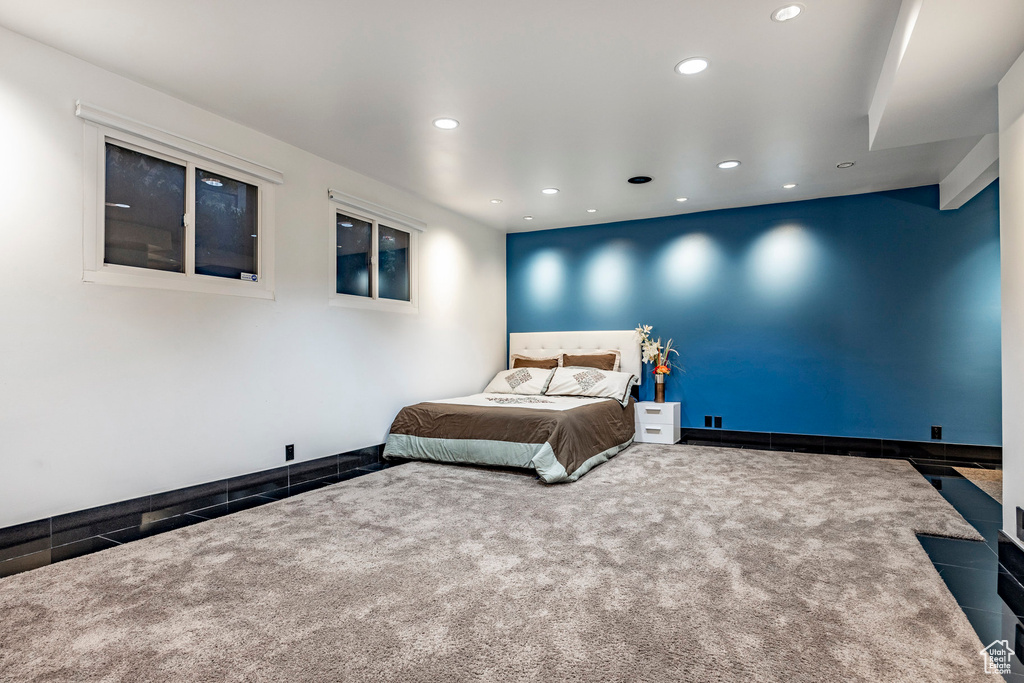 Carpeted bedroom featuring recessed lighting